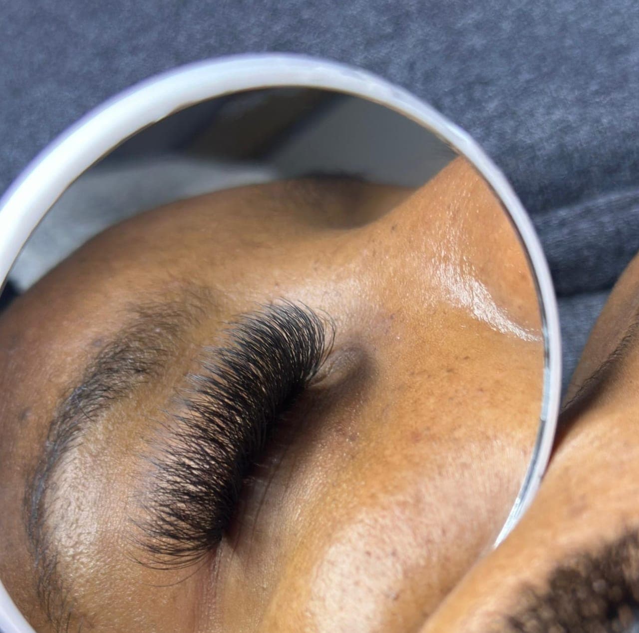 A dense volume lash set photographed close up